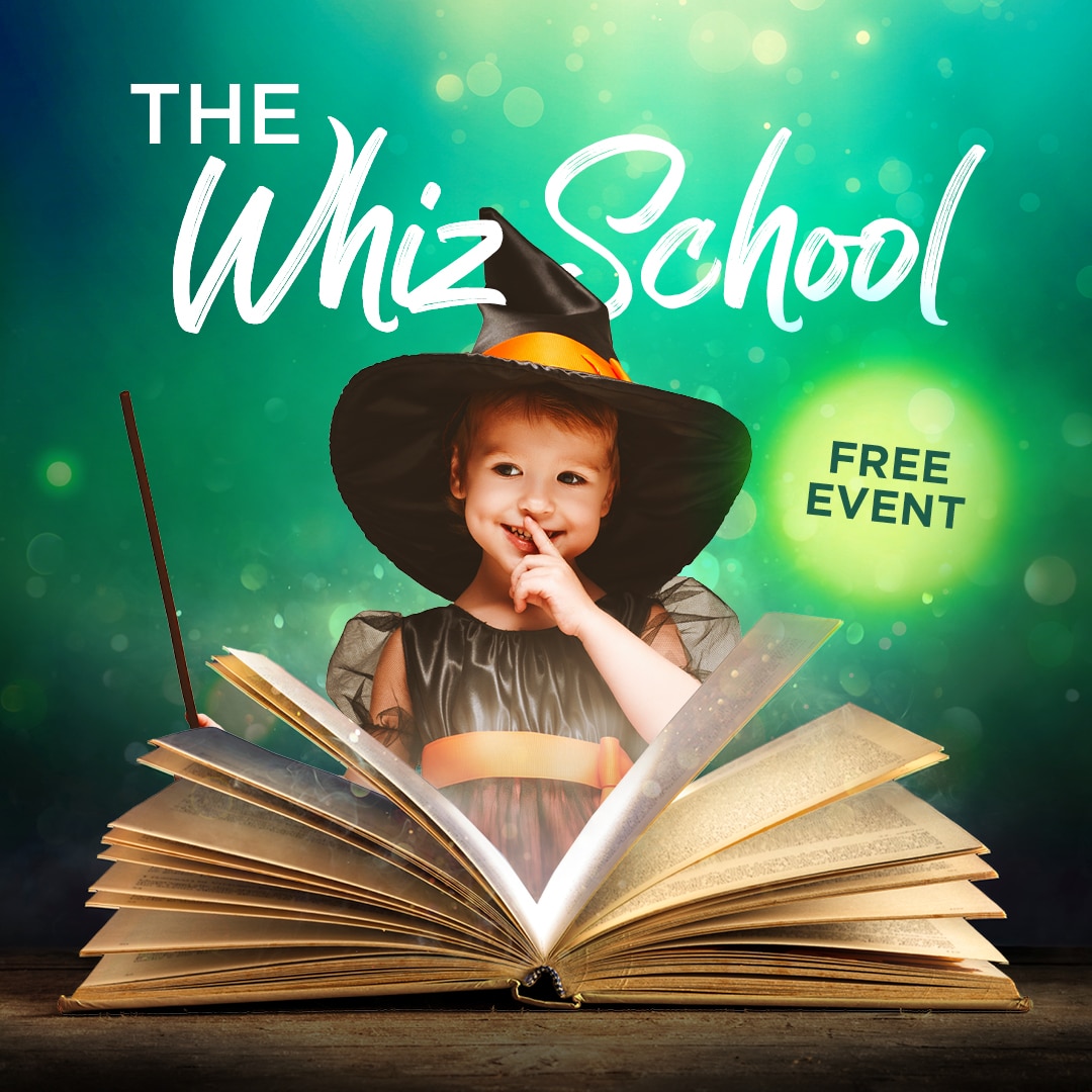 The whiz school, child dressed up as witch with cauldron